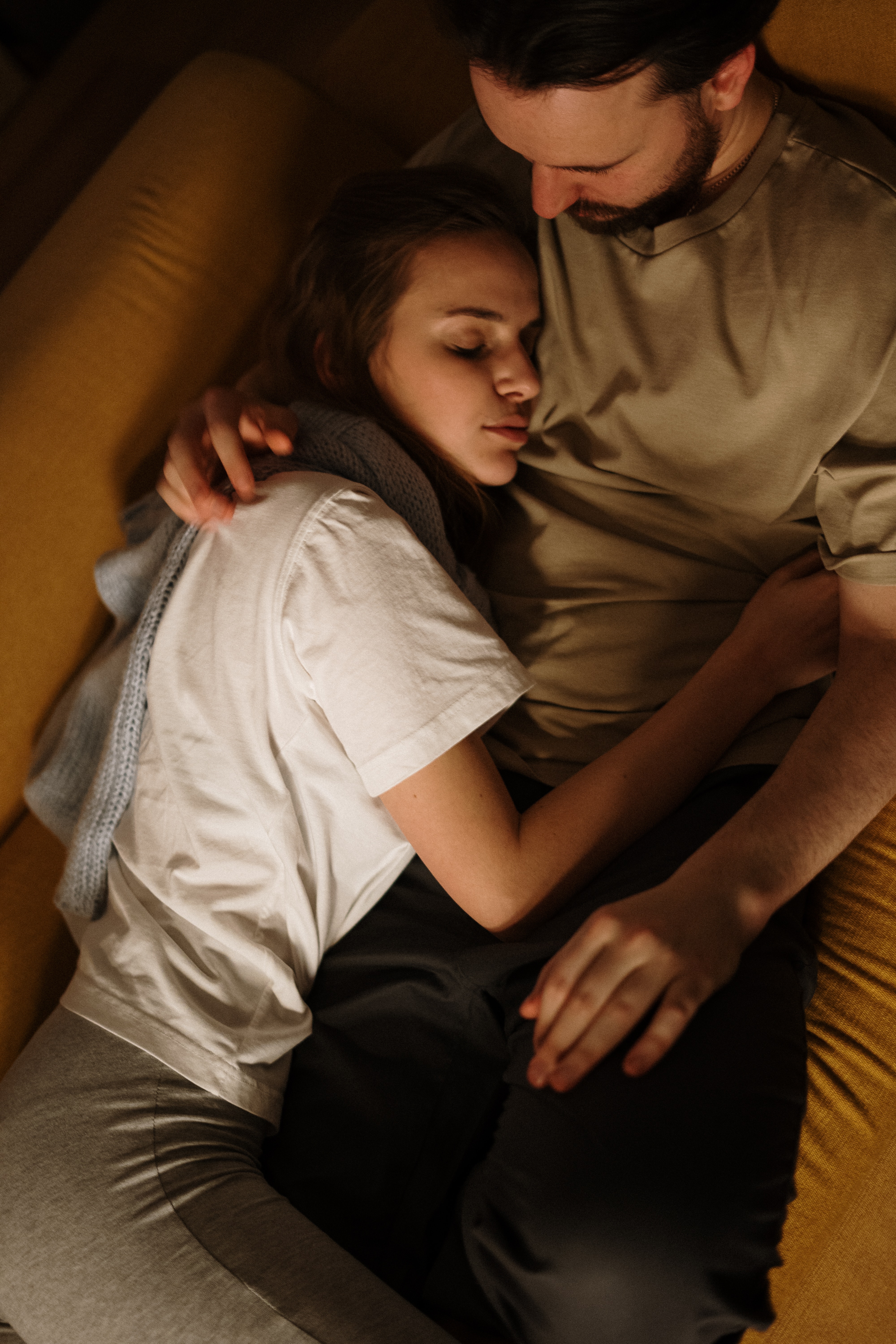 A couple close together, at ease with one another